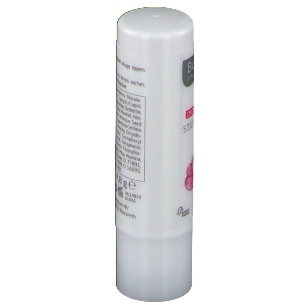 Witte lippenstift. Achterkant met ingrediënten, barcode en fabrikantgegevens.