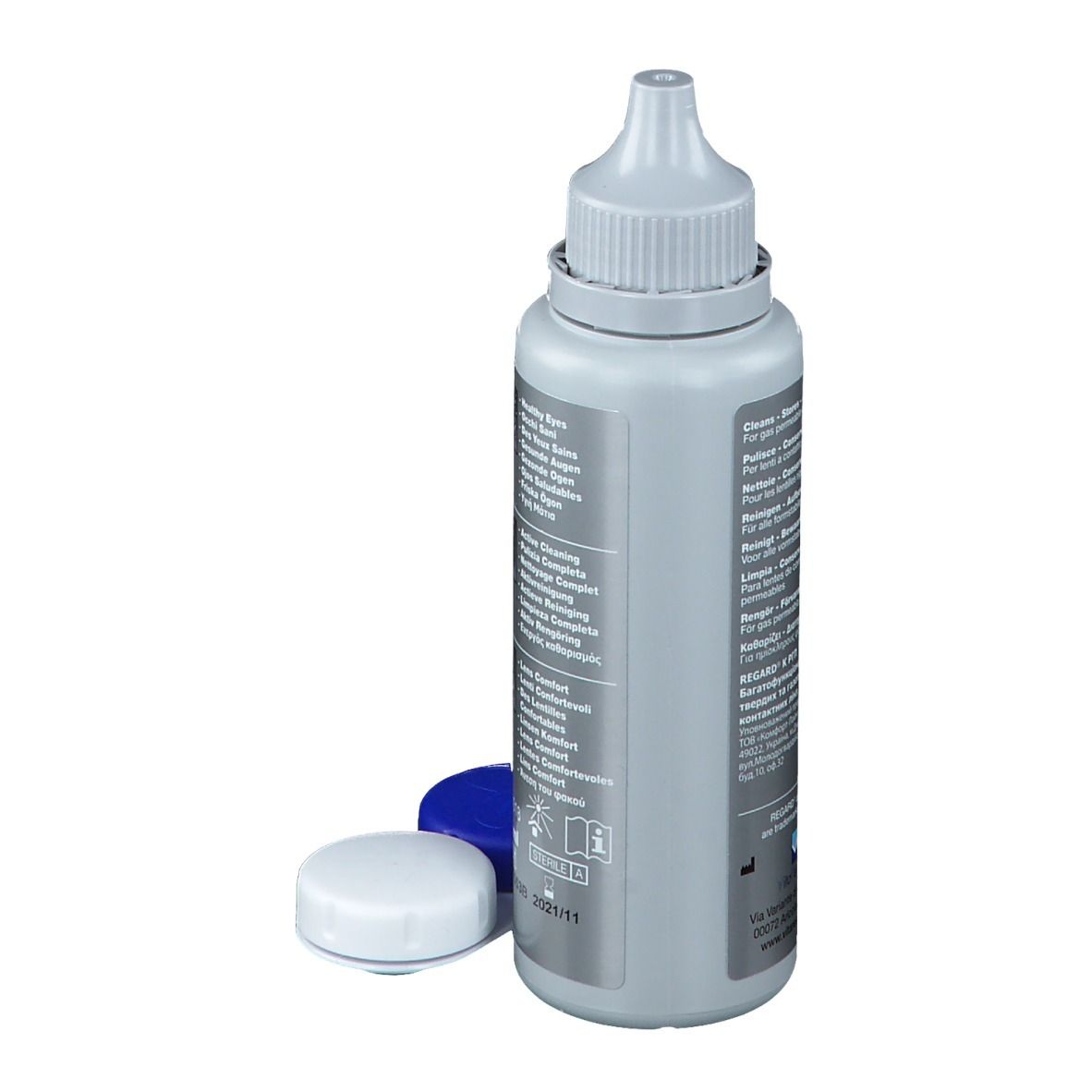 Achterkant van een fles contactlensvloeistof met doppen. Opschrift: Regard K, RGP, Contact Lens Solution. Meertalige tekst.