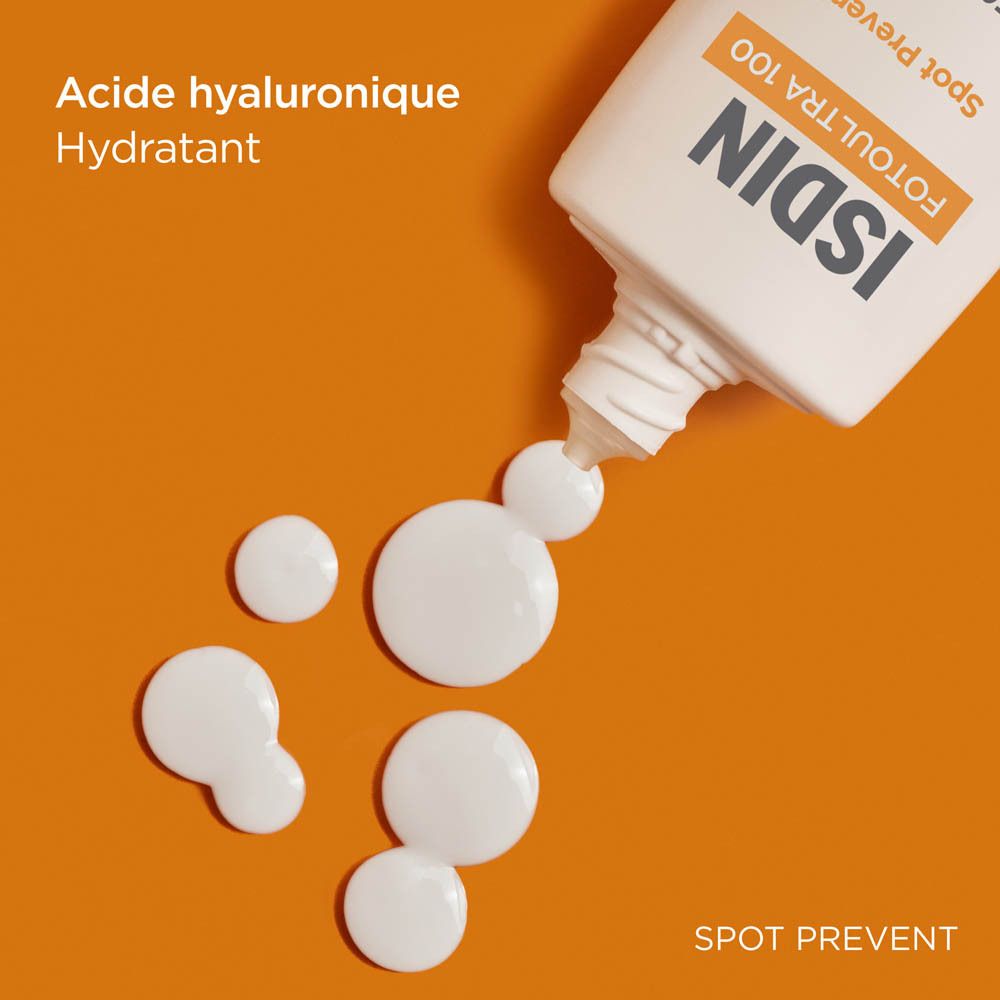 Crème blanche sur fond orange. Texte: Acide hyaluronique. Hydratant.