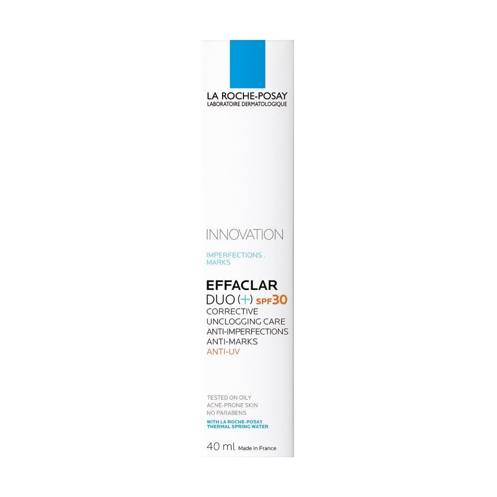 Tube Effaclar DUO+ SPF30 La Roche-Posay et étalement de crème. Logo: Recommandé par les dermatologues. Tube blanc, logos bleus.