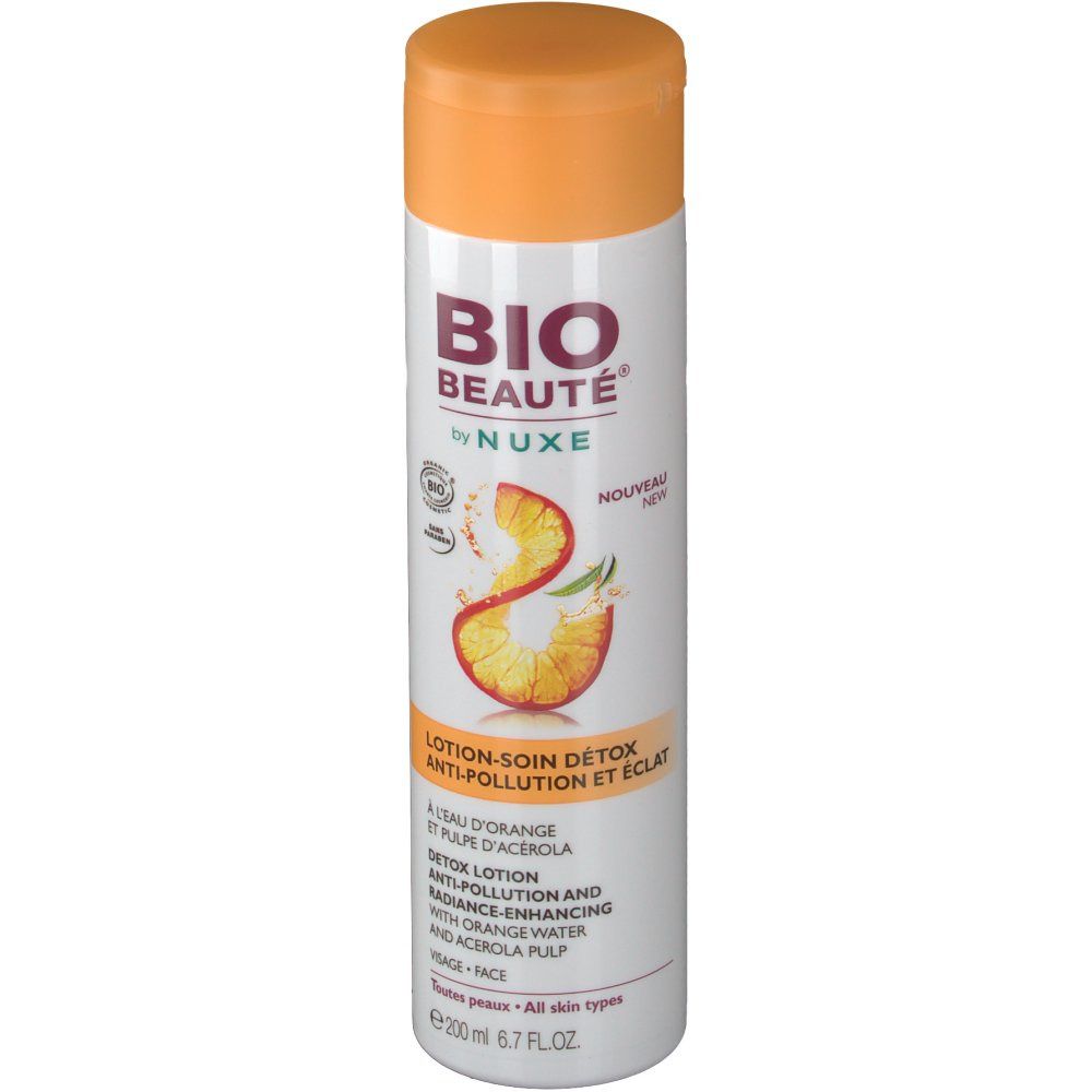 Witte fles met oranje dop. Opschrift: BIO BEAUTÉ by NUXE. Detox Lotion. Met sinaasappelwater en acerola pulp.