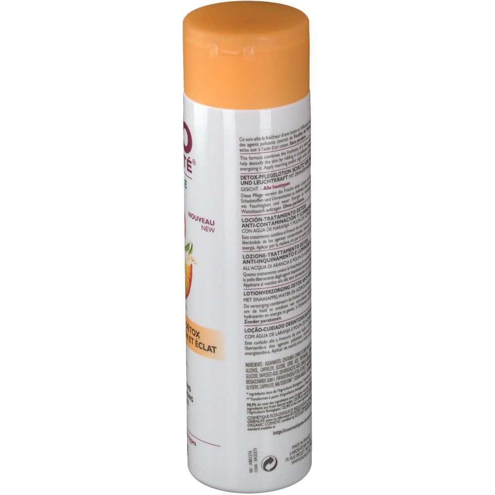 Witte fles met oranje dop. Achterkant met meertalige tekst. Detox Lotion. Voor alle huidtypes.