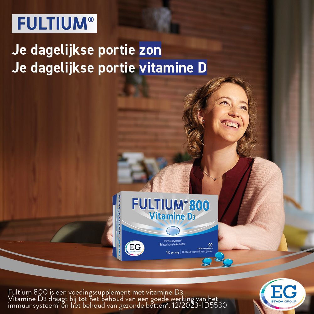 Lachende vrouw. Doos Fultium® 800 Vitamine D3. Tekst: Je dagelijkse dosis vitamine D.