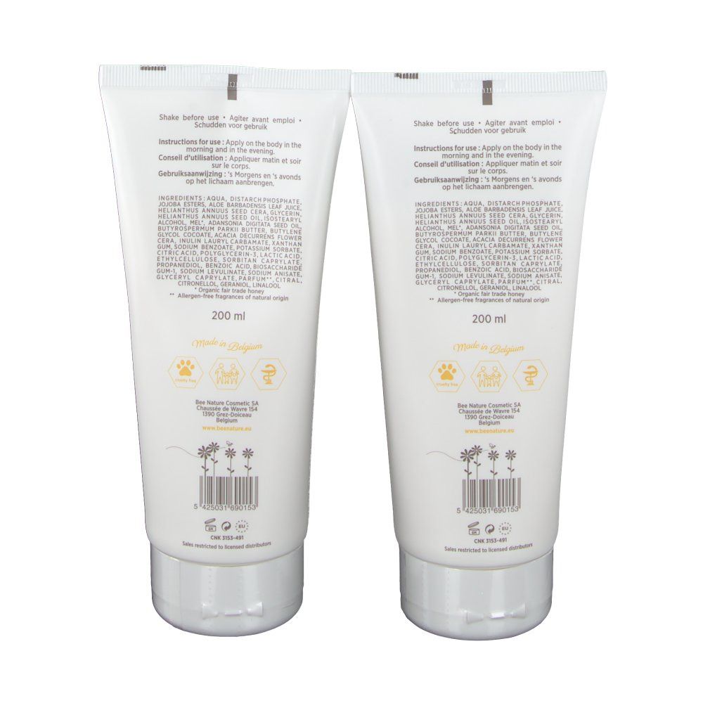 Achterkant van twee tubes Body Milk. Witte tubes met productinformatie en ingrediënten.