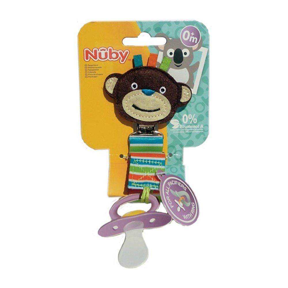 Attache-sucette Nuby avec motif singe, fixé sur un emballage. Comprend une sucette. Emballage avec logo et informations.
