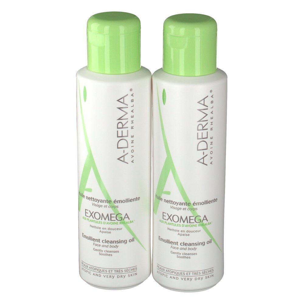 Twee flessen A-Derma EXOMEGA Duo Aceite Limpiador Emoliente. Witte flessen met groene doppen. Tekst: Emollient cleansing oil.