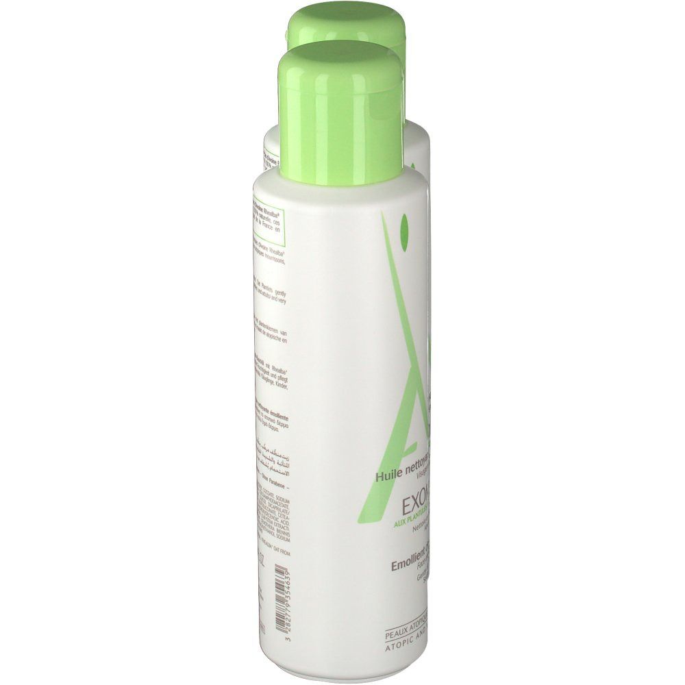Twee flessen A-Derma EXOMEGA Duo Aceite Limpiador Emoliente. Zijaanzicht. Witte flessen met groene doppen. Tekst op de fles.