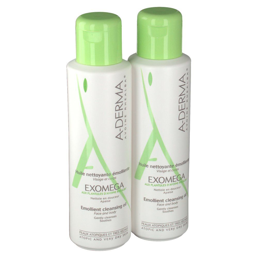 Twee flessen A-Derma EXOMEGA Duo Aceite Limpiador Emoliente. Witte flessen met groene doppen. Tekst: Emollient cleansing oil.
