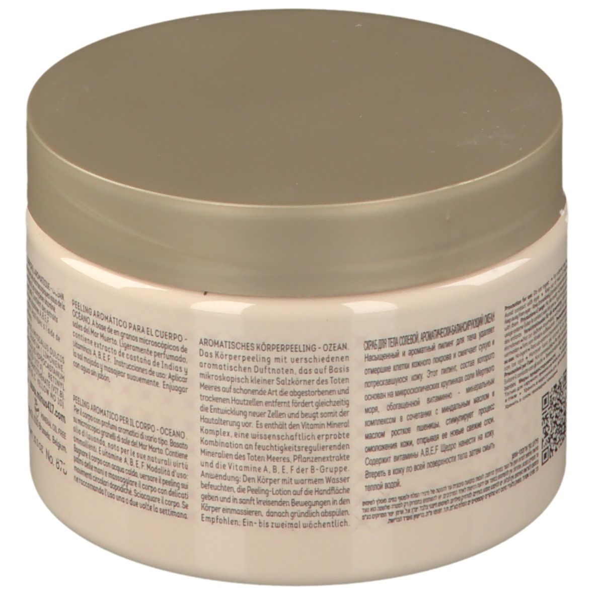 Beige pot met deksel. Tekst op achterkant. Opschrift: -417 Serenity Legend Aromatic Balancing Body Scrub Ocean.