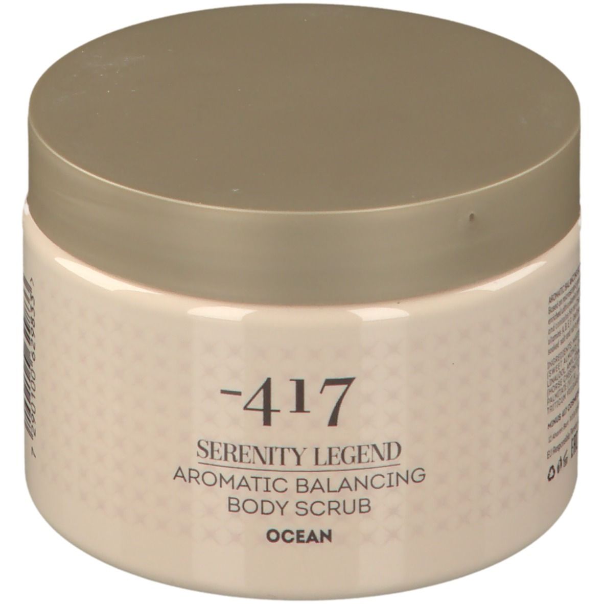 Beige pot met deksel. Opschrift: -417 Serenity Legend Aromatic Balancing Body Scrub Ocean.