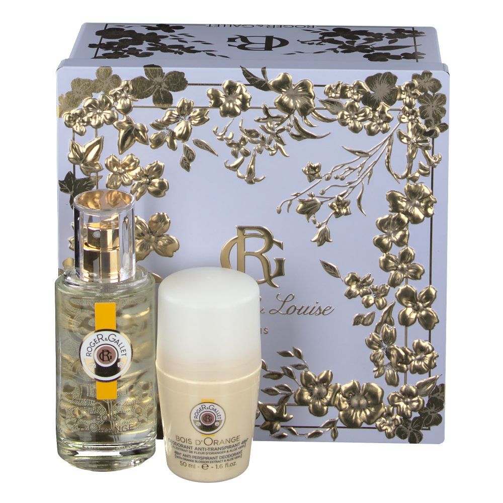 Coffret cadeau avec flacon, déodorant et boîte. Le flacon et le déodorant sont devant une boîte bleu clair avec des motifs floraux dorés.