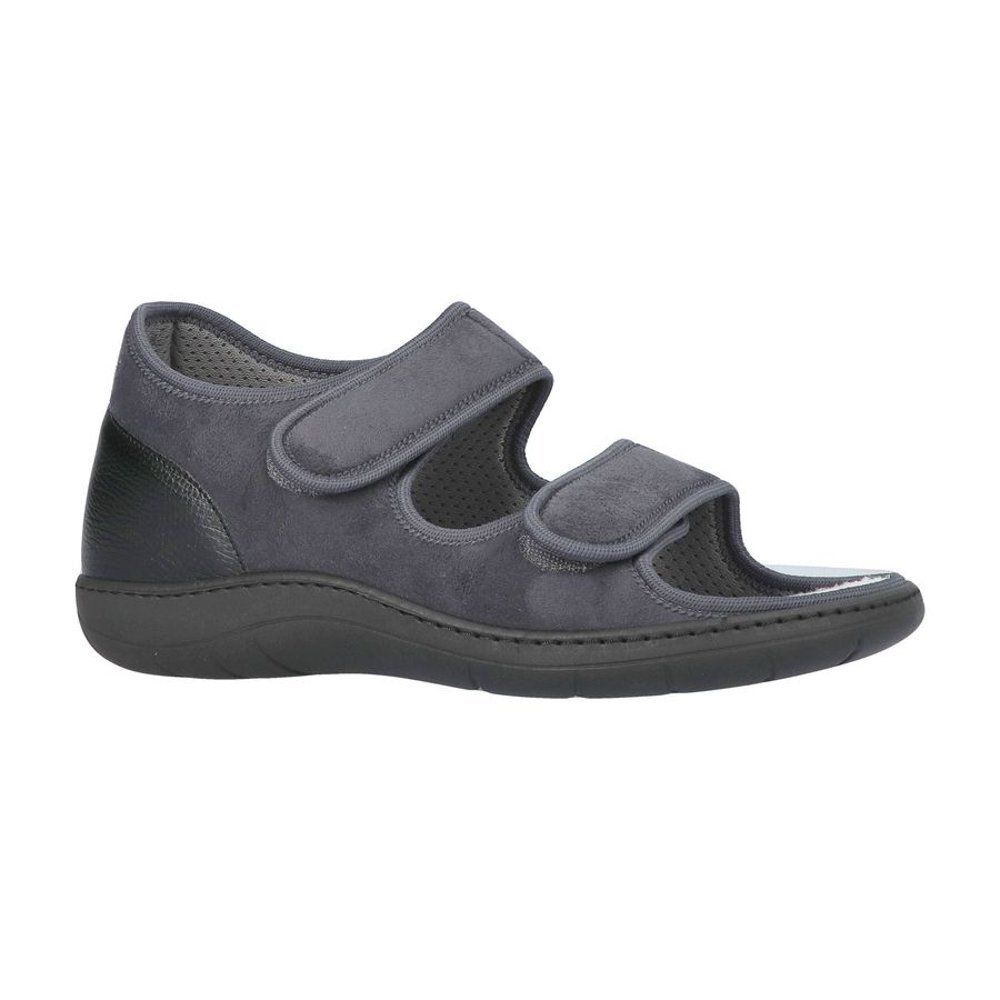 Sandale grise avec fermetures velcro. Semelle et talon noirs. Vue de côté.