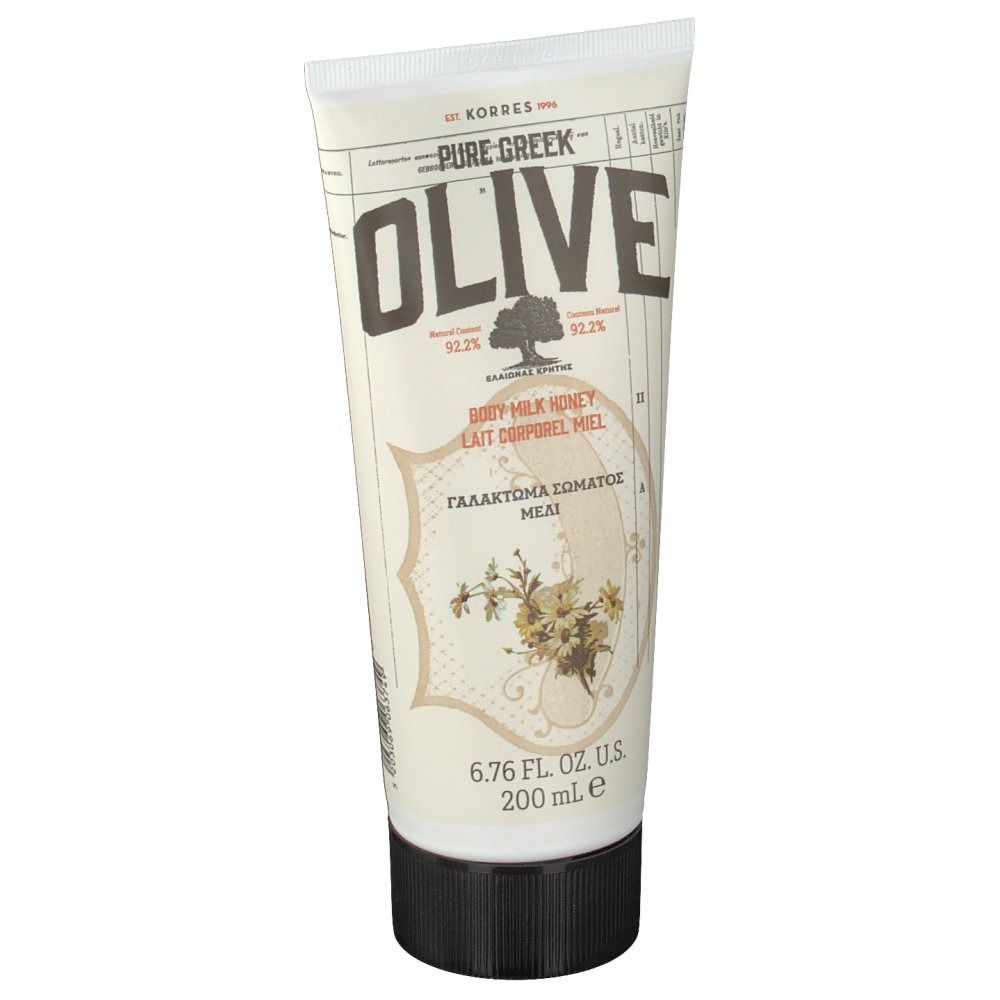 Crèmetube met tekst OLIVE en BODY MILK HONEY. Zwarte dop. 6.76 FL. OZ. U.S. 200 ml.