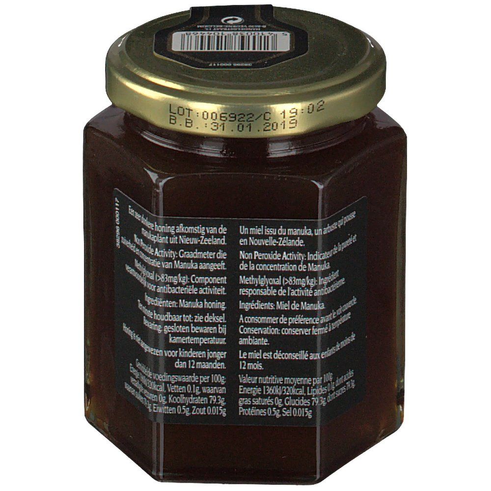 Zeshoekige pot honing met tekst op zwart etiket en gouden deksel. Barcode op deksel.