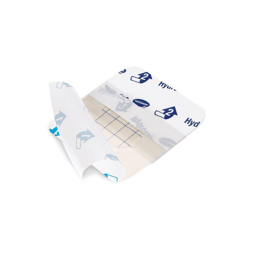 Pansement transparent partiellement décollé. Motif quadrillé visible. Marque Hartmann.