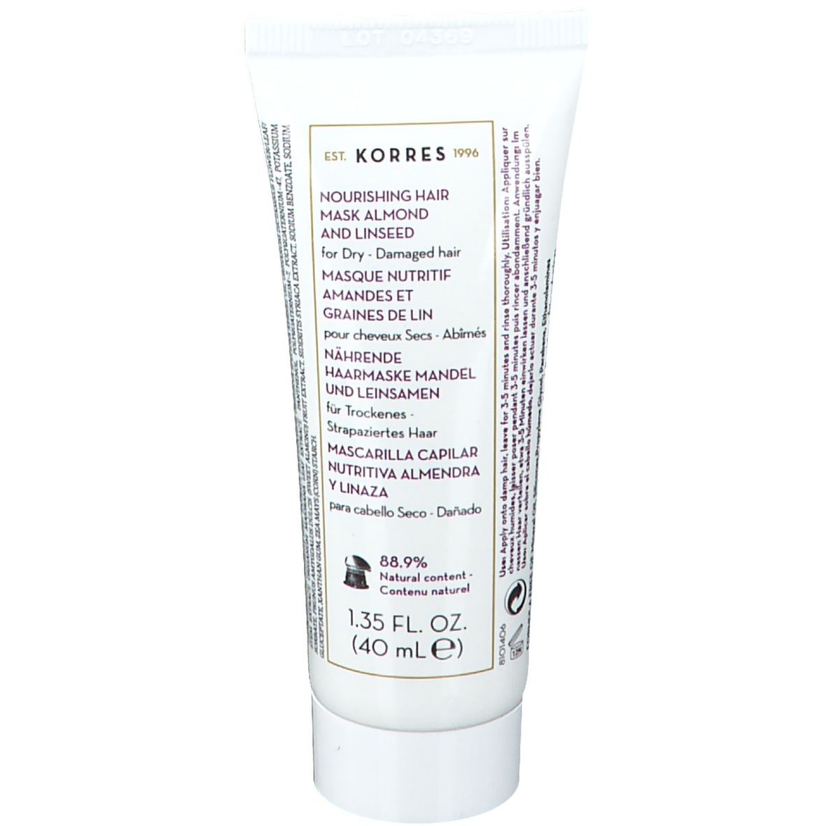 Tube blanc avec texte produit. Marque KORRES® et texte pour cheveux secs. Volume indiqué.