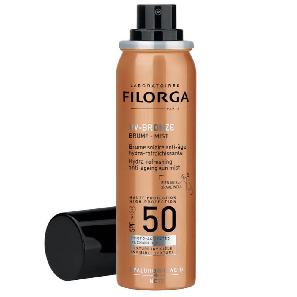 Zonnespray met zwarte dop. Opschrift: UV-Bronze, SPF 50. Merk: Filorga.