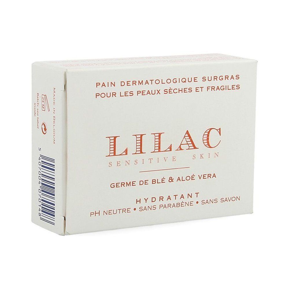 Boîte blanche avec logo Lilac et texte. Contient Germe de blé & Aloe Vera. Inscription: Pain Dermatologique Surgras.