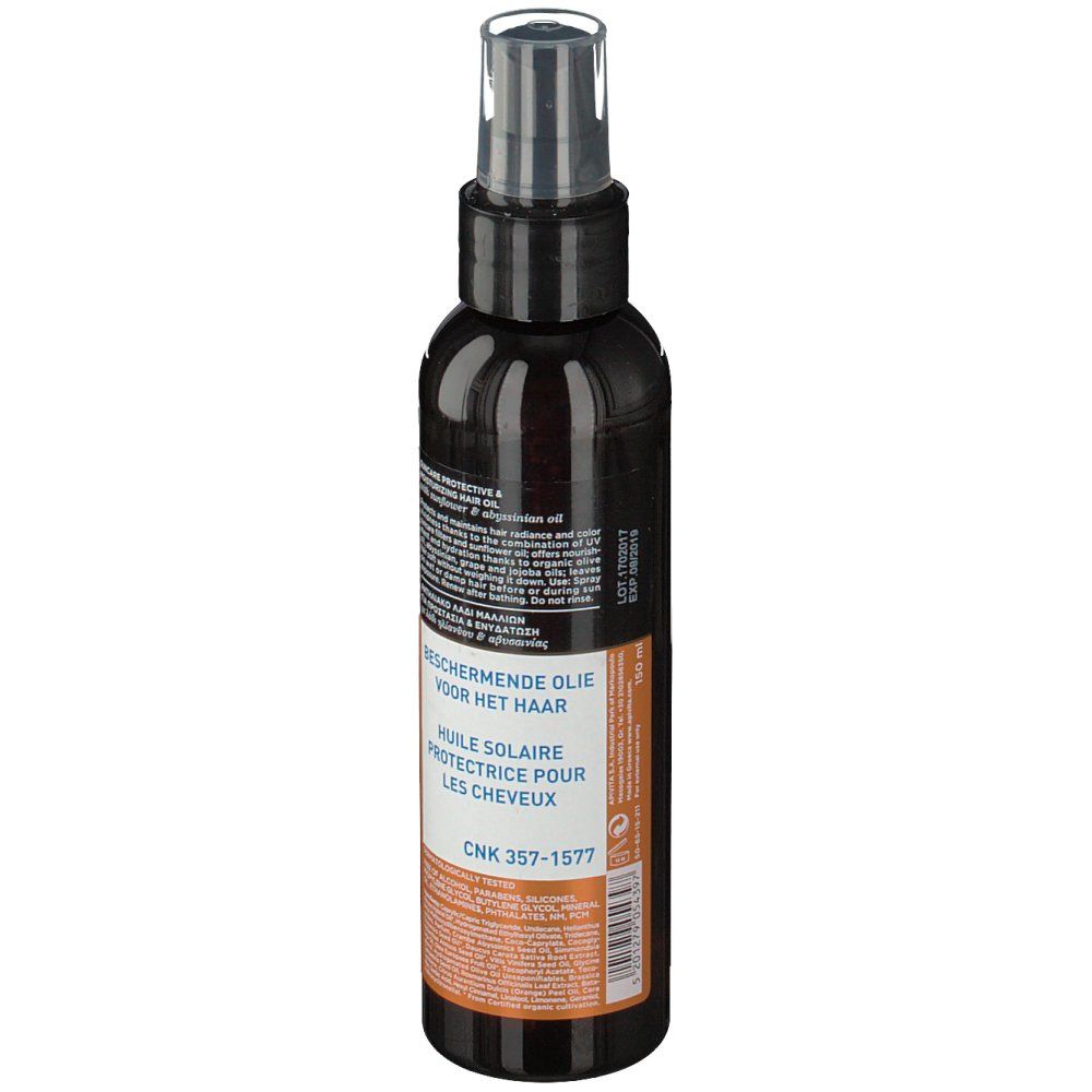 Flacon foncé avec vaporisateur. Dos avec texte multilingue. CNK 357-1577.