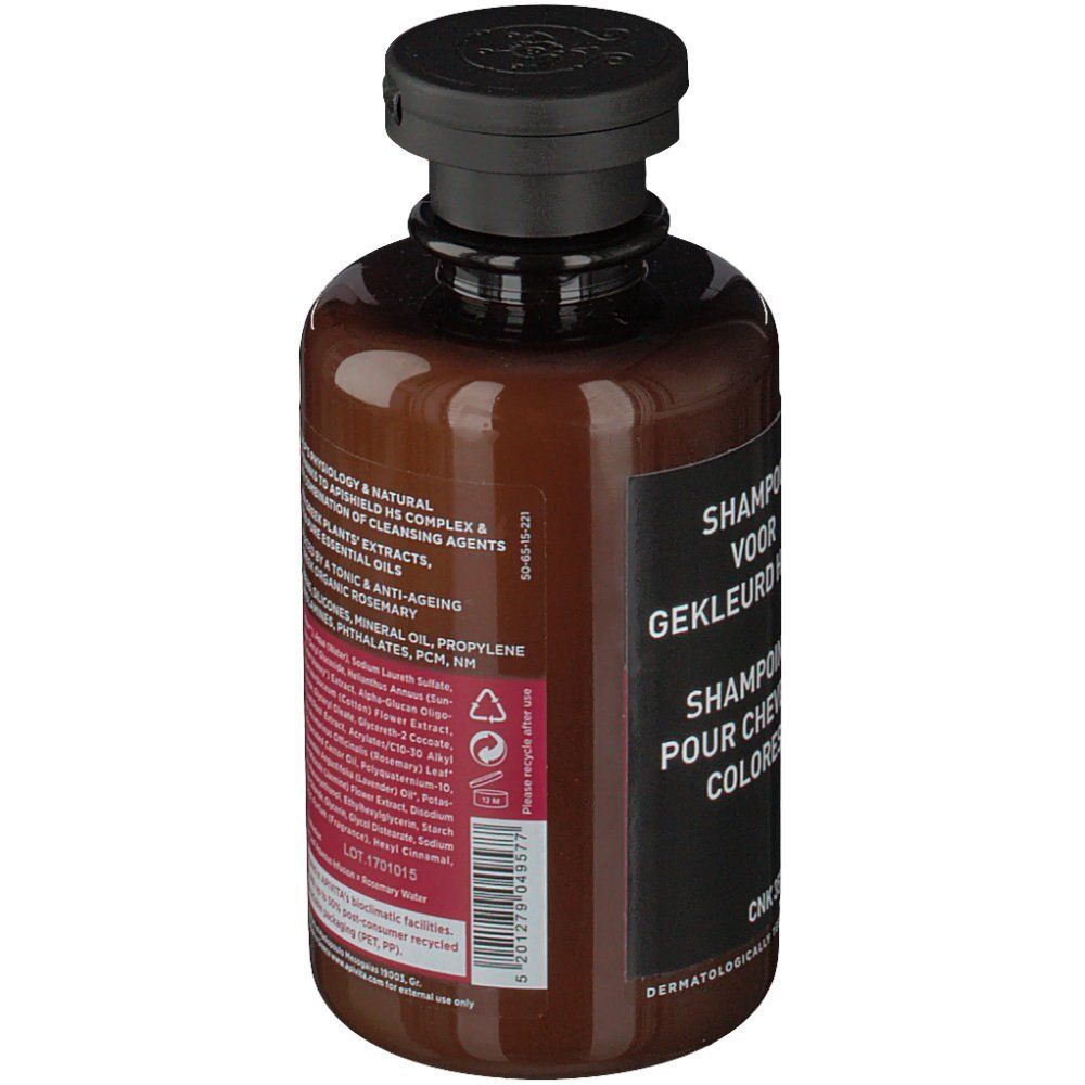 Achterkant van de bruine fles. Etiket met tekst in het Nederlands en Frans.