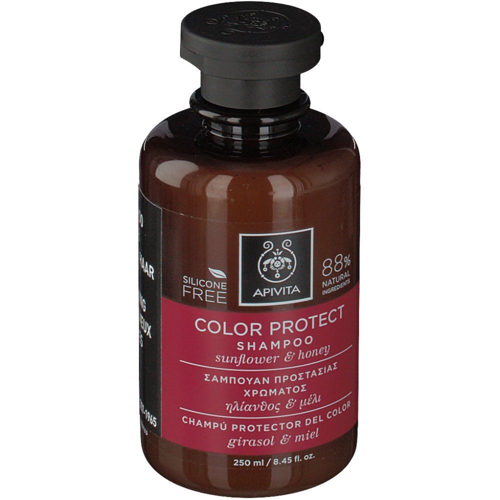 Bruine fles met zwarte dop. Etiket met Apivita-logo en 'COLOR PROTECT SHAMPOO'.