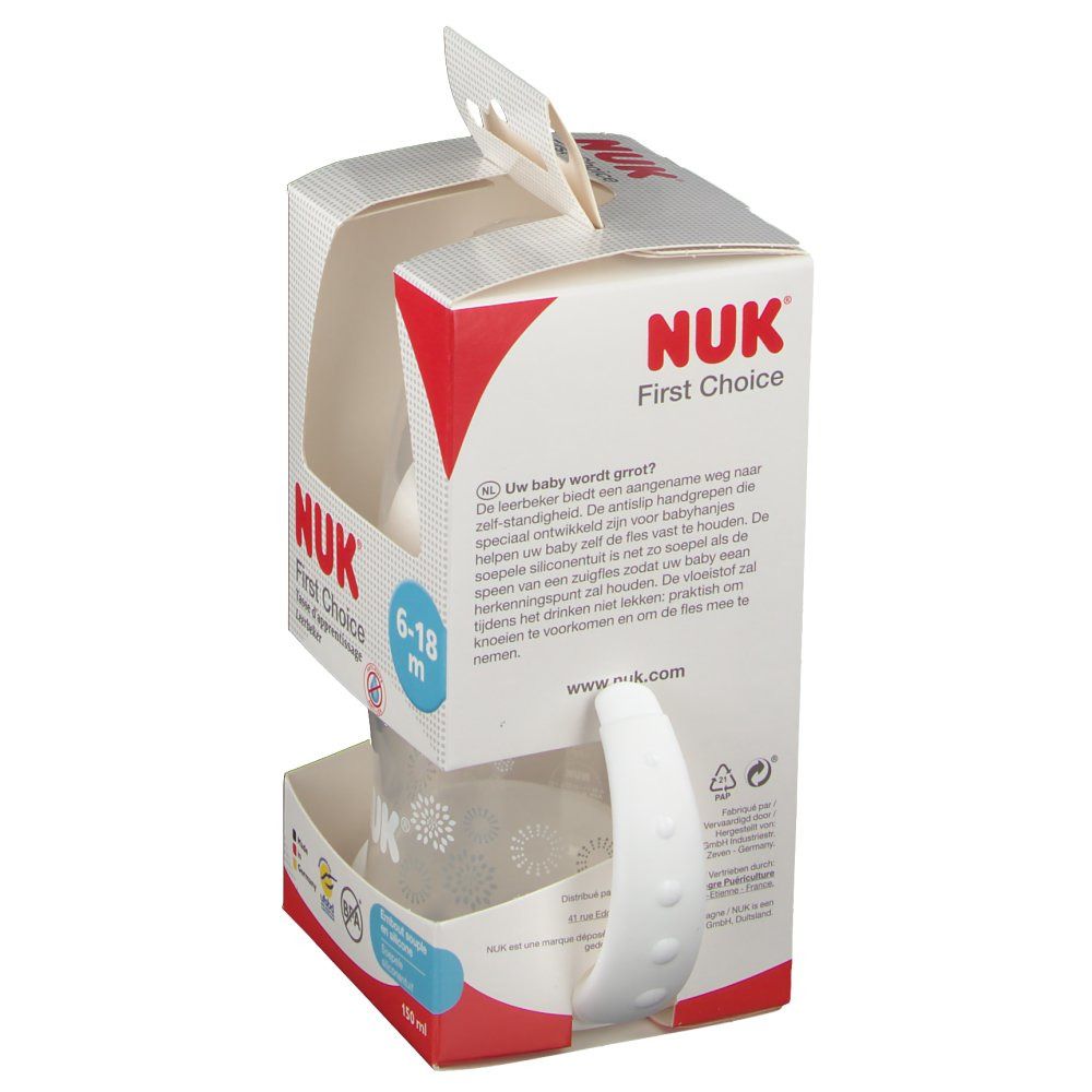 Verpakking van de NUK First Choice oefenbeker. Beker met handvatten zichtbaar in geopende verpakking.