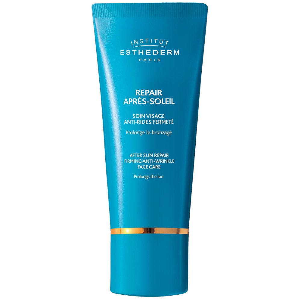 Turquoise tube met gouden details. Tekst: INSTITUT ESTHEDERM PARIS, REPAIR APRÈS-SOLEIL, SOIN VISAGE.