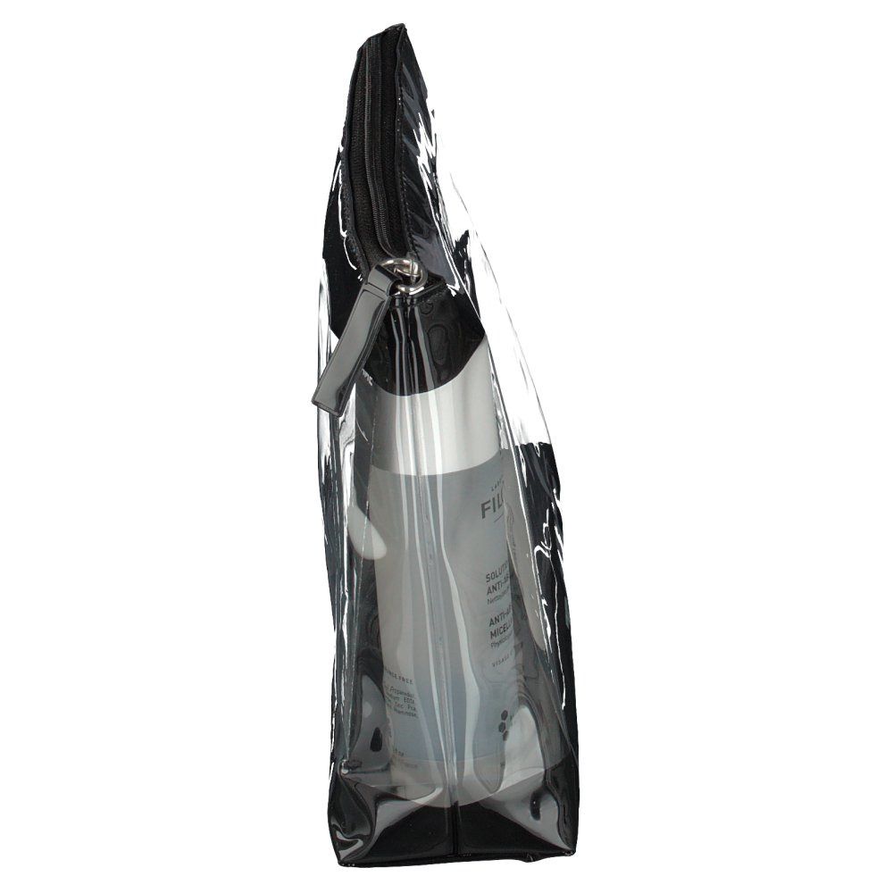 Transparante toilettas met zwarte rits. Bevat een witte fles. Zijaanzicht.