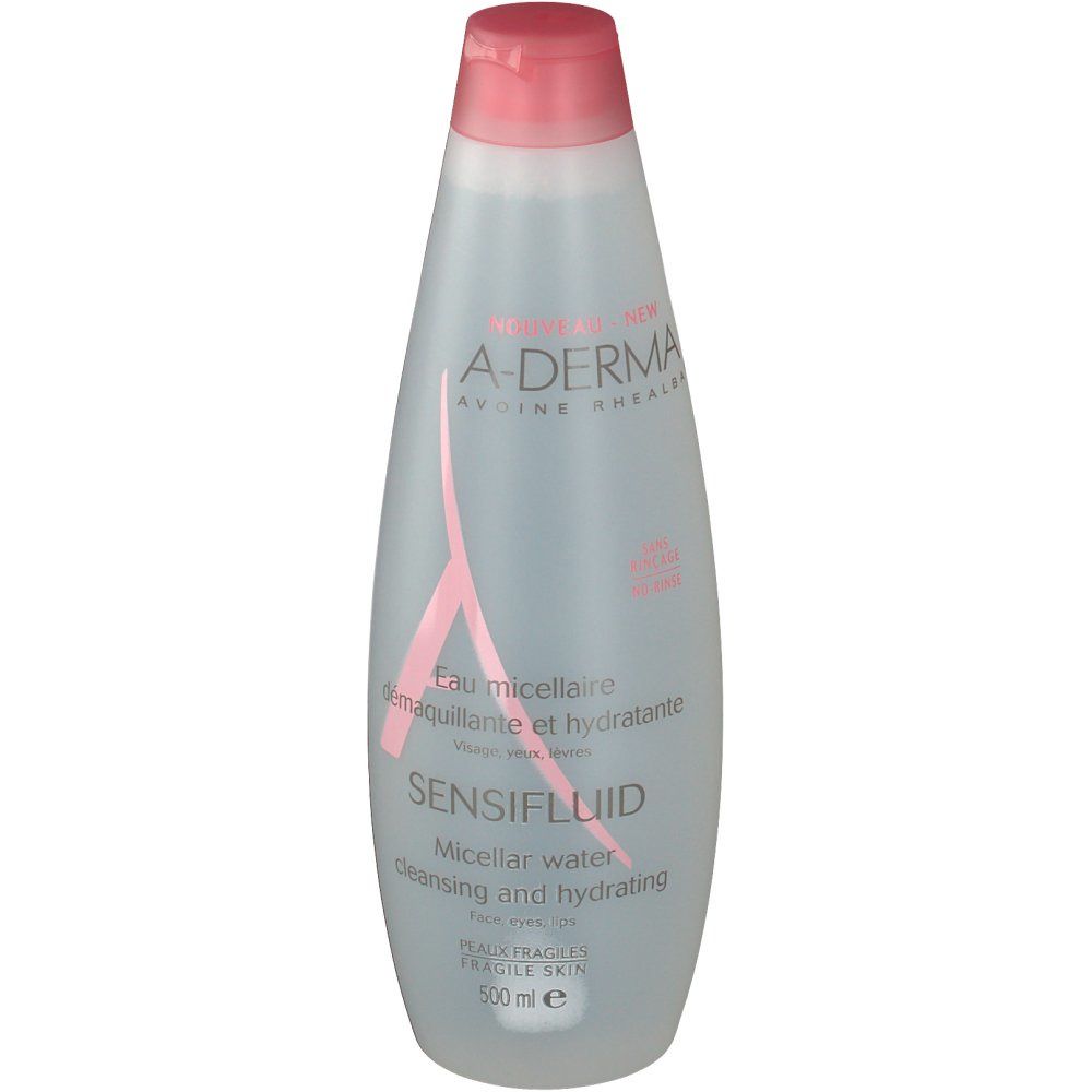 Flacon transparent avec bouchon rose. Logo A-DERMA et nom du produit SENSIFLUID. Texte sur le flacon. 500 ml.