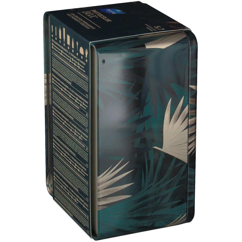 Boîte Phyto Phytocolor. Motif floral vert. Vue latérale avec motif floral. Texte: informations produit. Logo Phyto Paris.