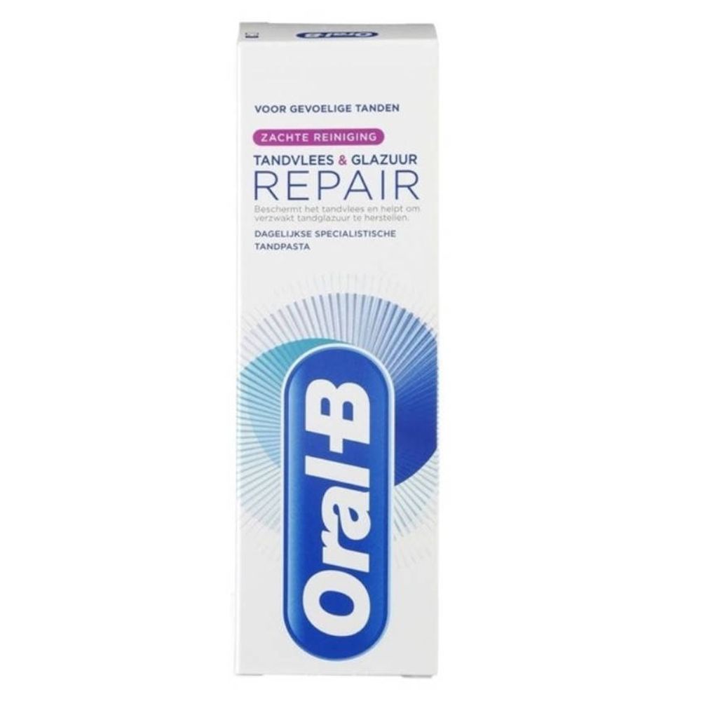 Tandpastatube. Wit, met blauw logo en tekst. "Tandvlees & Glazuur Repair" en "Oral-B" zichtbaar.