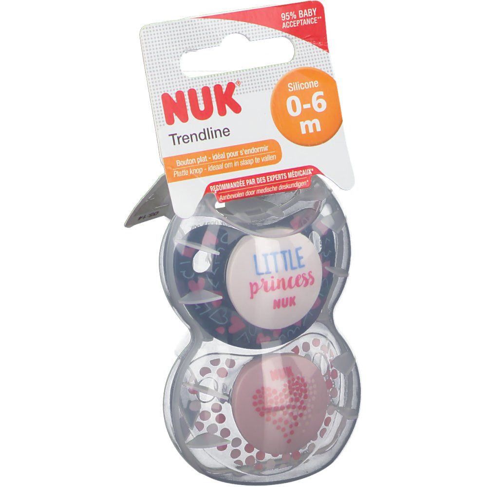 Deux sucettes dans un emballage transparent. Inscriptions : NUK, Trendline, 0-6 m, Little Princess. Emballage avec crochet.
