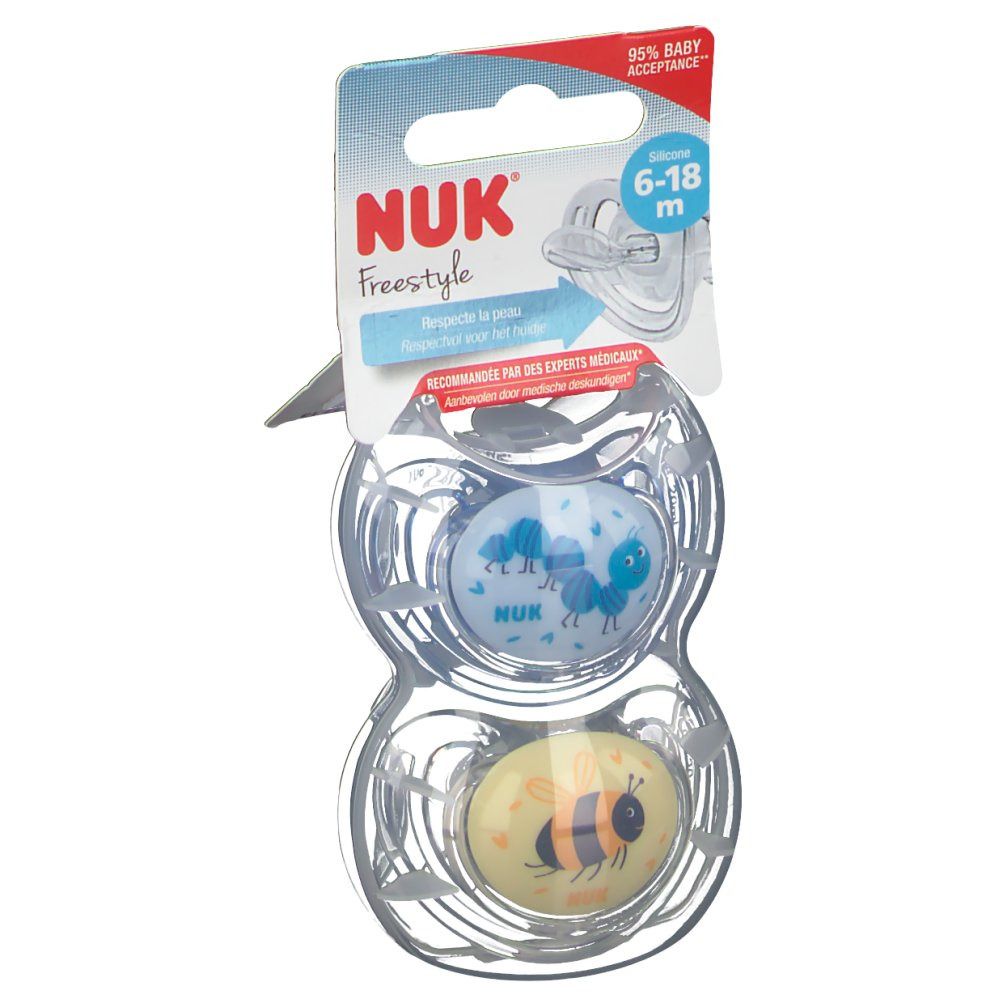 Twee NUK Freestyle fopspenen, maat 2 (6-18 maanden), in verpakking. Blauwe en gele speen met dierenontwerp.