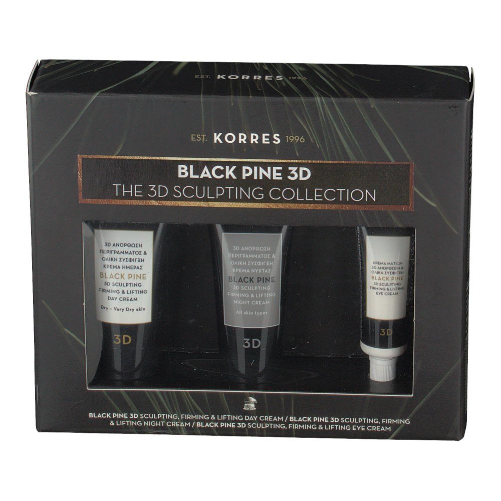 Zwarte geschenkverpakking met drie tubes cosmetica. Merknaam en tekst zijn zichtbaar.