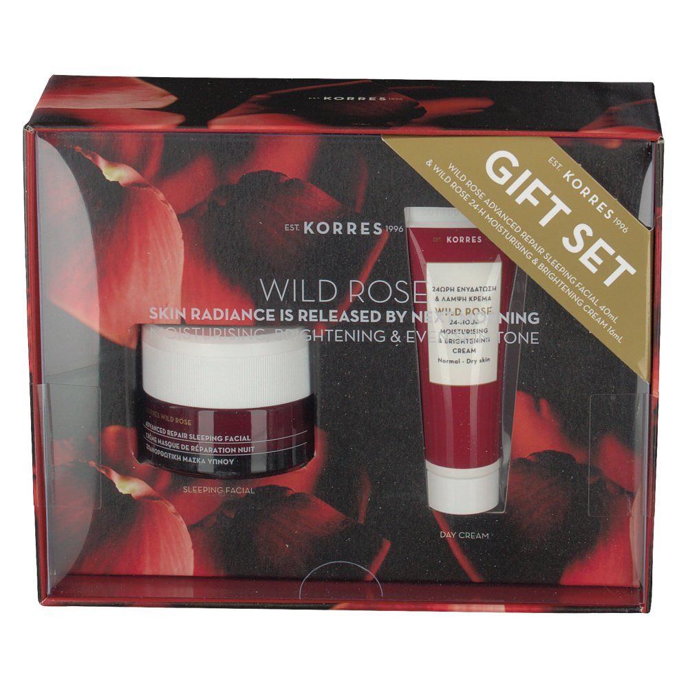Cadeauset met twee cosmetische producten. Een pot en een tube in een rode verpakking met transparante deksel. Tekst: Wild Rose, Gift Set.