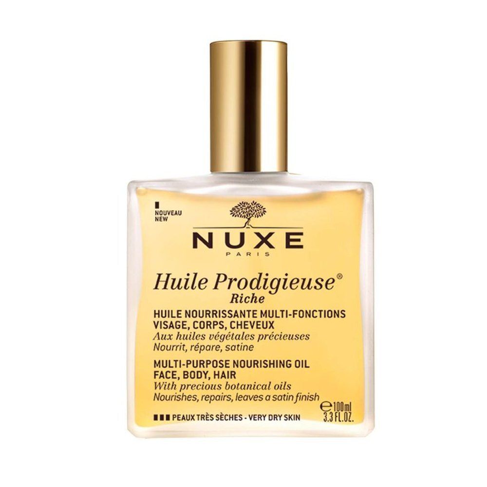 Flacon NUXE Huile Prodigieuse Riche avec bouchon doré. Huile jaune pour le visage, le corps et les cheveux.