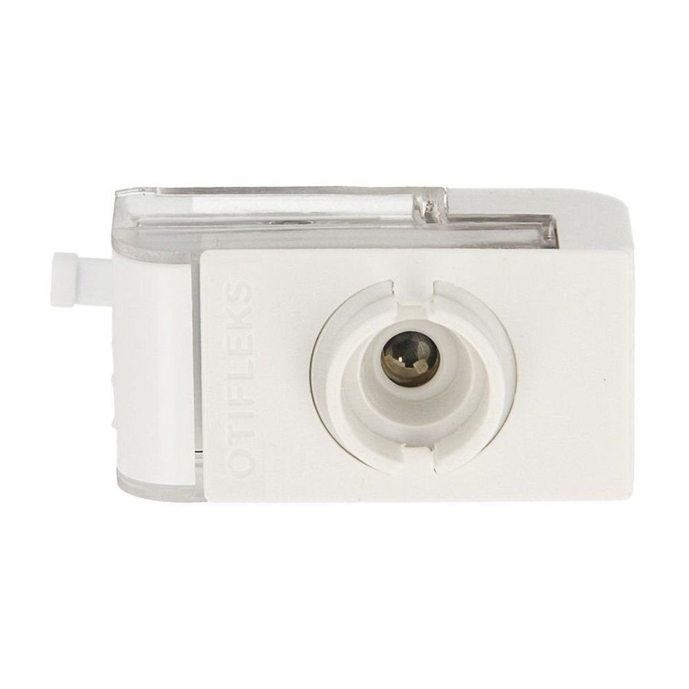 Appareil blanc rectangulaire avec couvercle transparent. Inscription : OTIFLEKS. Ouverture ronde avec pièce métallique.
