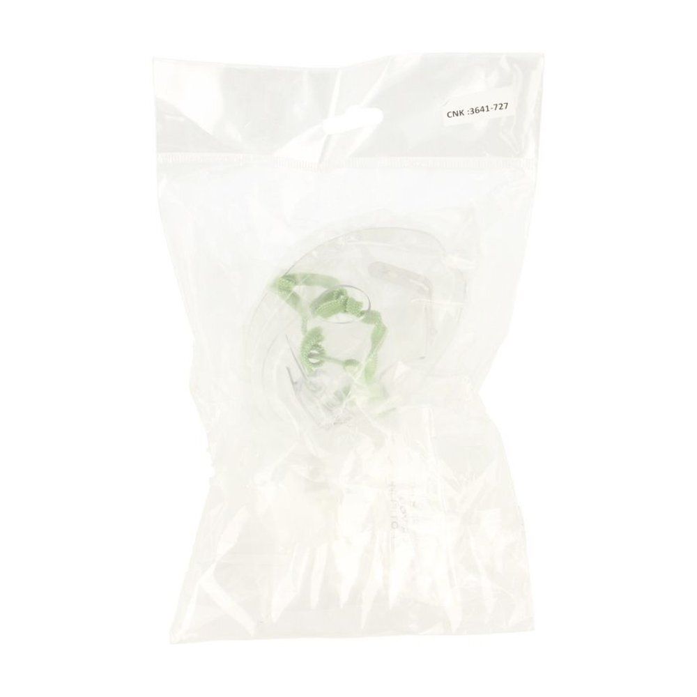 Masque avec sangle verte, emballé dans un sac plastique transparent. Numéro de référence imprimé sur le sac.