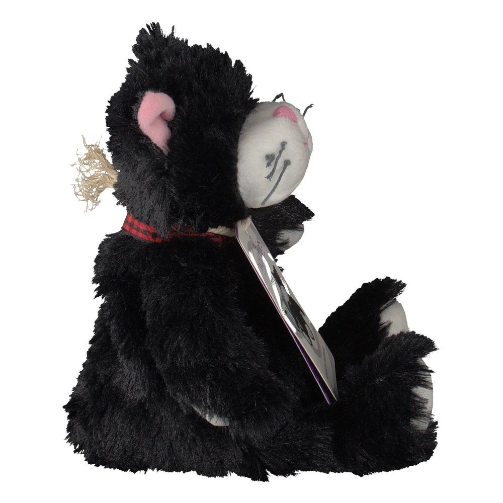 Chat noir en peluche de profil, assis. Visible : visage blanc, oreille rose, étiquette. Étiquette avec image du produit.