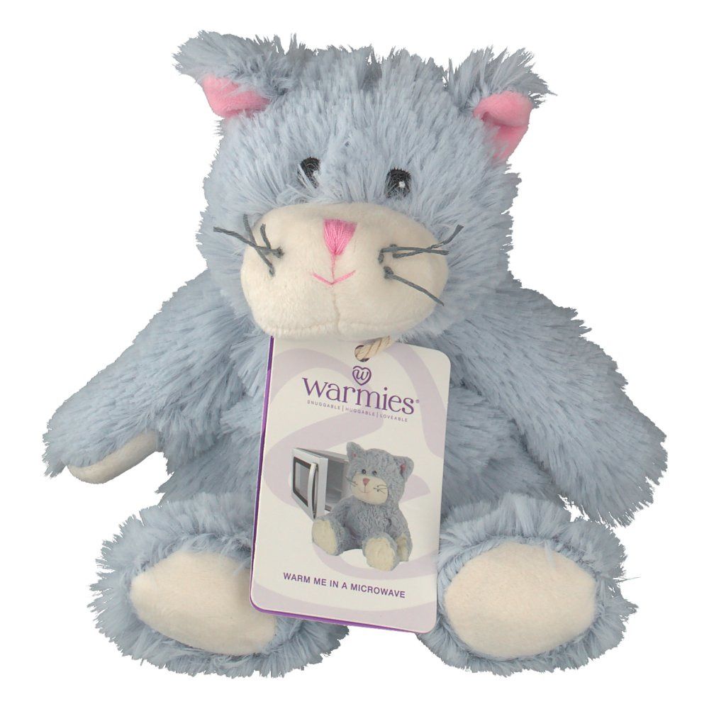 Chat en peluche gris avec oreilles et nez roses. Étiquette avec logo et image du produit. Texte : "Warmies".