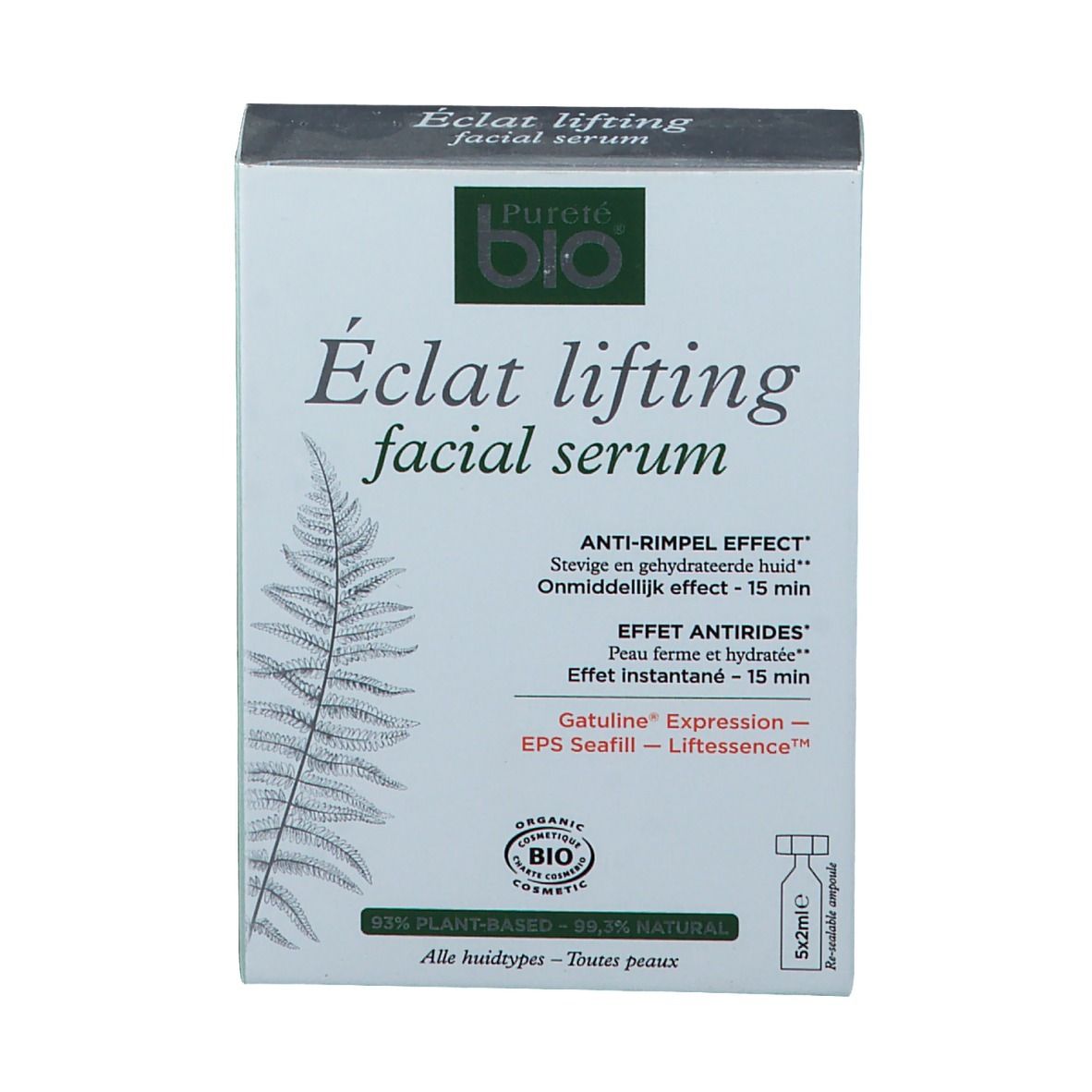 Boîte de sérum facial. Logo et nom du produit visibles. Certificat bio. Ingrédients et effets mentionnés.