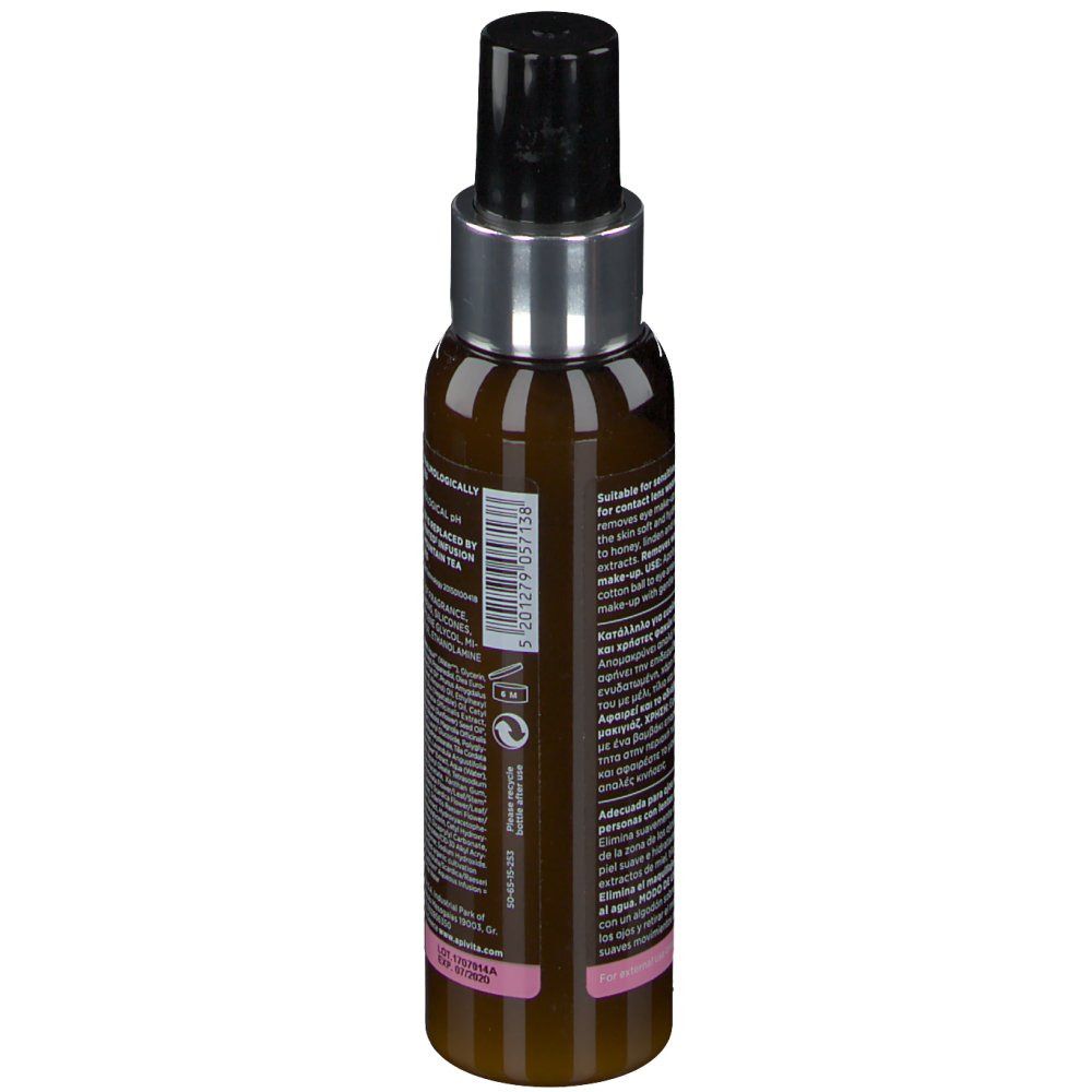 Dos du flacon marron. Texte et code-barres. Marque: Apivita. Étiquette rose en bas.