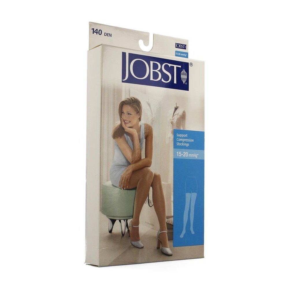 Boîte de bas de compression JOBST, 140 DEN, 15-20 mmHg. Image d'une femme assise.