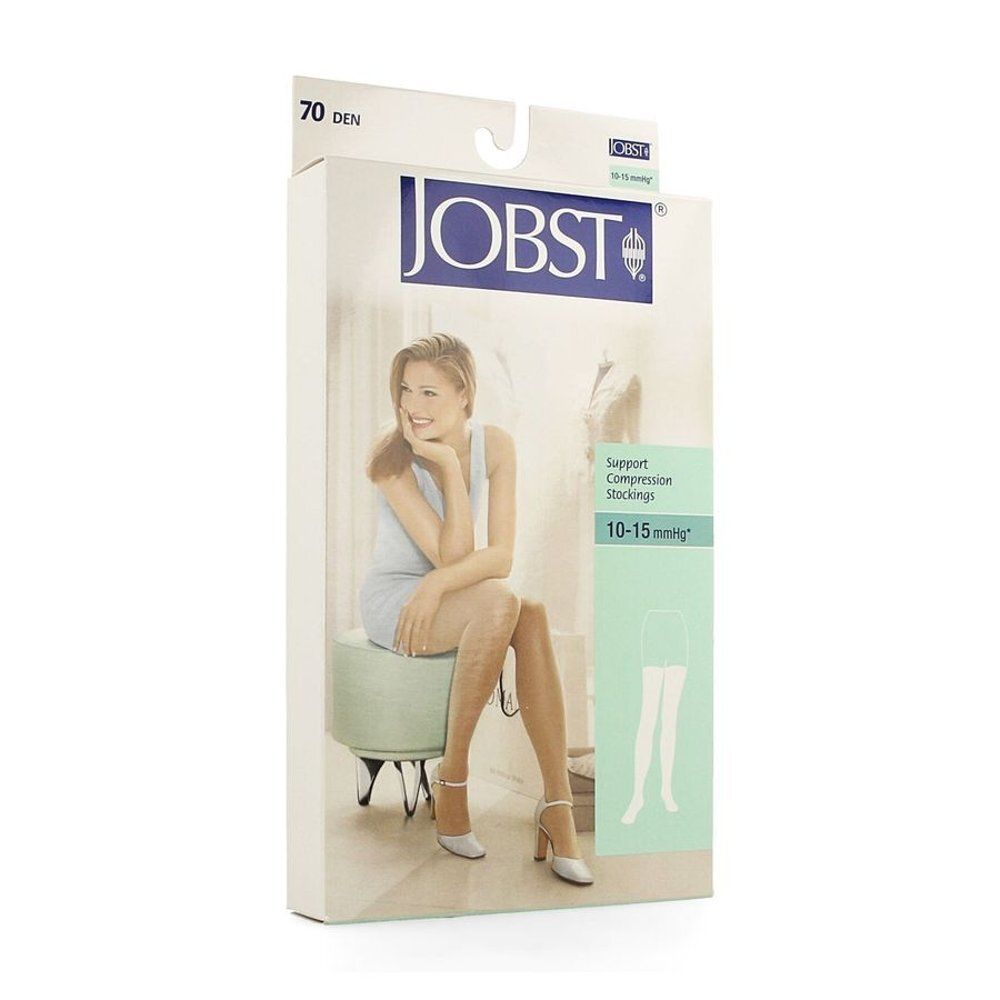 Emballage JOBST® avec bas. Inscription: 70 DEN, 10-15 mmHg. Illustration d'une femme portant des bas.