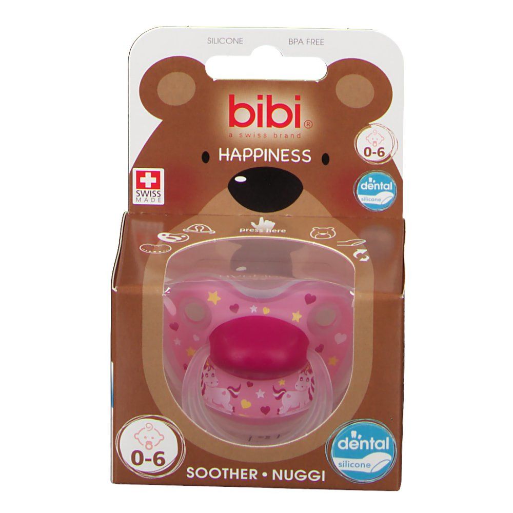 Verpakking met fopspeen. Roze fopspeen met sterren en hartjes in bruine doos. Logo en leeftijd 0-6 maanden.