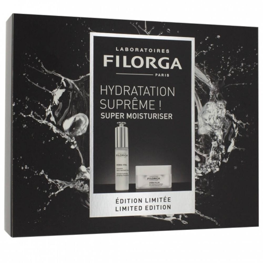 Filorga cadeauverpakking. Bevat een fles en een pot. Zwarte achtergrond met waterspetters. Tekst: Hydra-Hyal, Super Moisturiser. Limited edition.