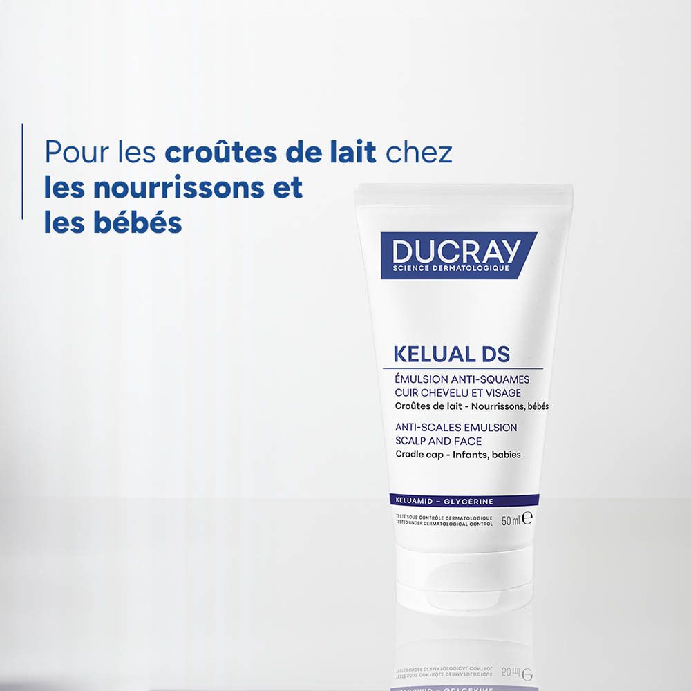 Tube blanc à bouchon bleu, Ducray Kelual DS Émulsion Anti-Squames.