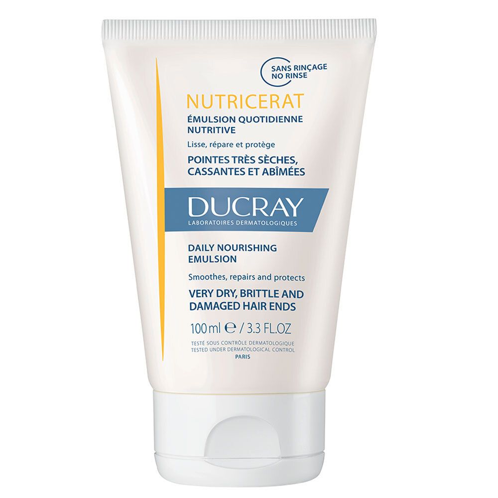 Witte tube met gele en blauwe tekst. Productnaam: Nutricerat. Voor zeer droog, broos haar. 100 ml.