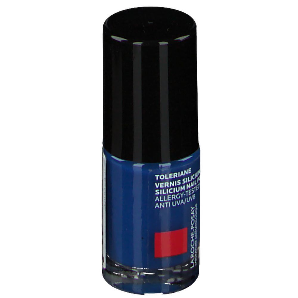 Donkerblauwe nagellakfles met zwarte dop. Merk La Roche-Posay. Tekst: Toleriane, Silicium Nail Polish.