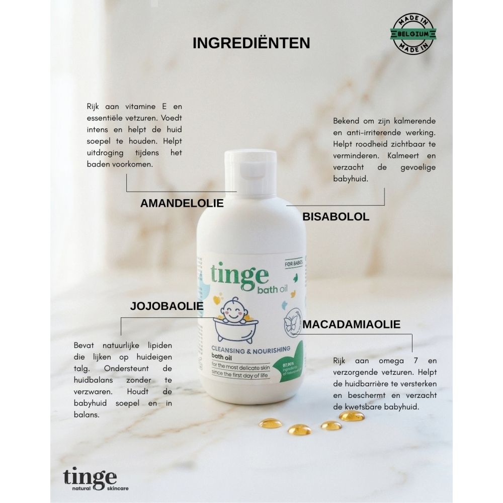 Productfles met etiket. Opschrift: tinge bath oil, Cleansing & Nourishing bath oil. Met baby-illustratie.